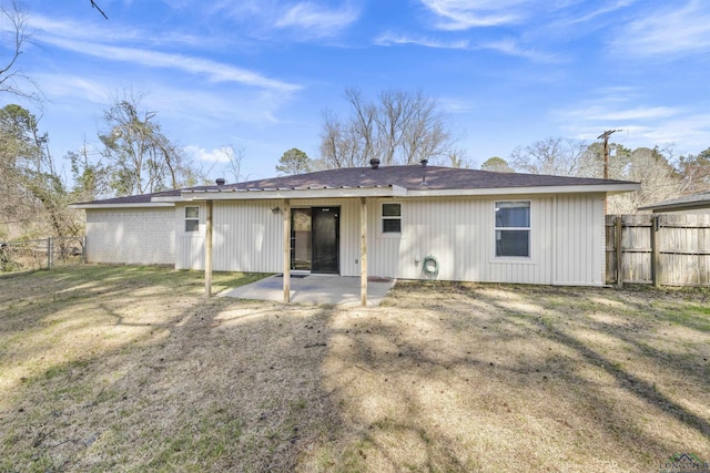 1324 Annette Dr, Longview, TX 75604 - rear view of property featuring a patio area and board and batten siding