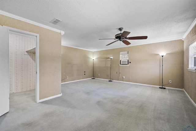 1324 Annette Dr, Longview, TX 75604 - empty room featuring ornamental molding, ceiling fan, a textured ceiling, carpet flooring, and cooling unit