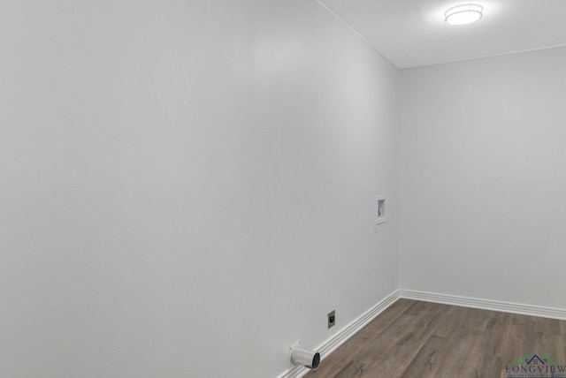 washroom with washer hookup, dark hardwood / wood-style floors, and hookup for an electric dryer