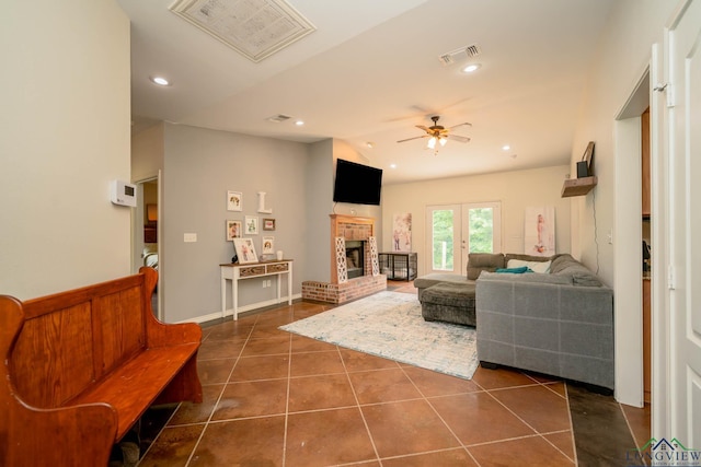 16591 Landons Way, Winona, TX 75792 - living room featuring ceiling fan, dark tile patterned flooring, a brick fireplace, recessed lighting, and vaulted ceiling