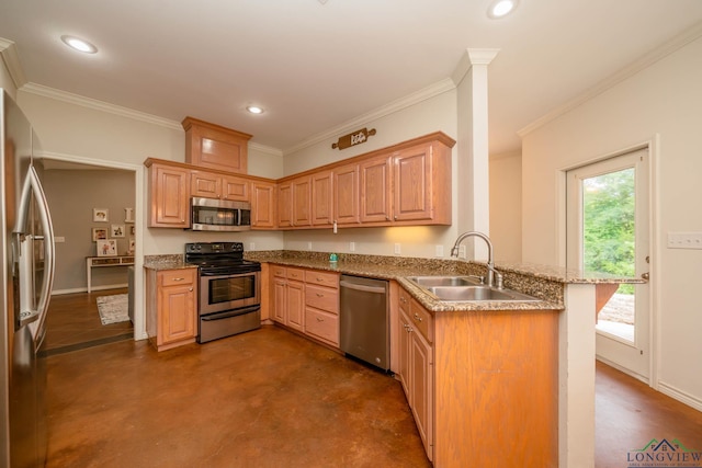 16591 Landons Way, Winona, TX 75792 - kitchen with stainless steel appliances, a peninsula, finished concrete floors, ornamental molding, and recessed lighting