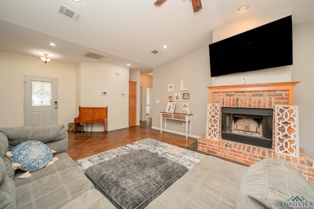 16591 Landons Way, Winona, TX 75792 - living room with tile patterned flooring, recessed lighting, ceiling fan, and a fireplace