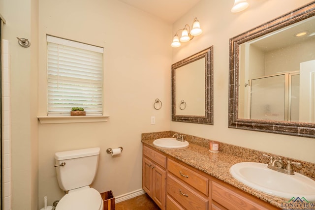 16591 Landons Way, Winona, TX 75792 - full bathroom with double vanity and a shower with shower door