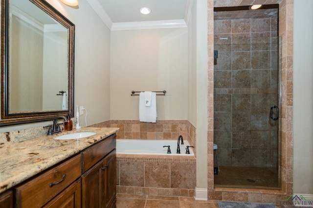 bathroom with tile patterned flooring, vanity, ornamental molding, and plus walk in shower