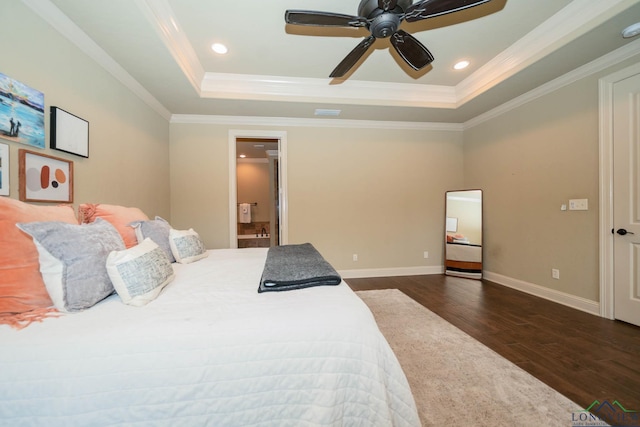 bedroom with dark hardwood / wood-style flooring, a raised ceiling, ceiling fan, and crown molding