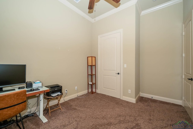 office space featuring dark colored carpet, vaulted ceiling, ceiling fan, and ornamental molding