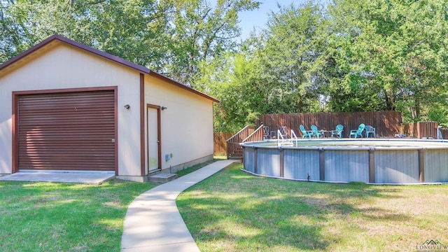 view of yard with a fenced in pool