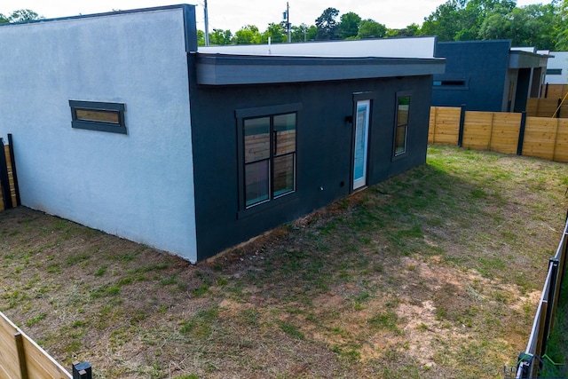 1516 Mahlow Dr, Longview, TX 75601 - rear view of house with stucco siding