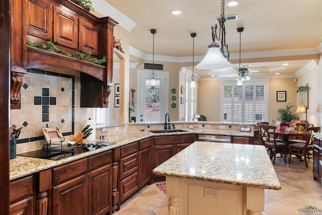 kitchen with stainless steel dishwasher, black electric stovetop, crown molding, and sink