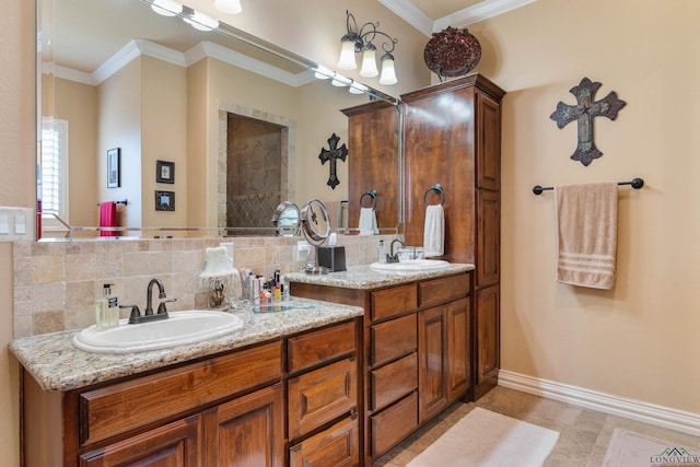 bathroom featuring ornamental molding and vanity