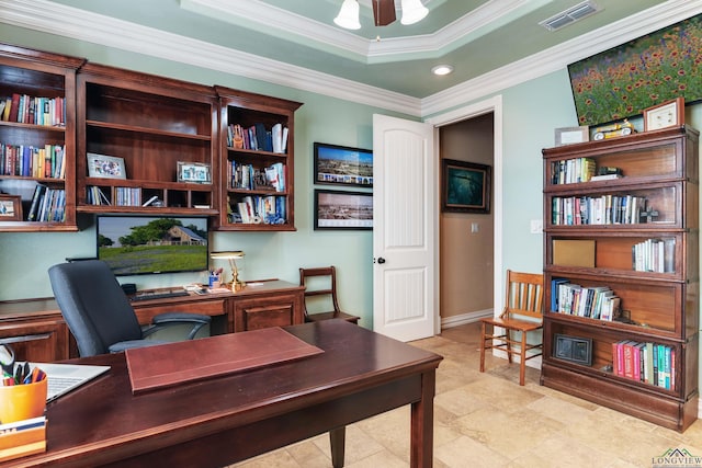 office space featuring a raised ceiling, ceiling fan, and crown molding