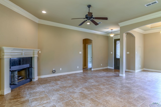 unfurnished living room featuring crown molding, ceiling fan, and a high end fireplace