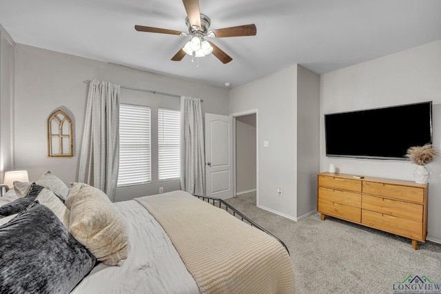 bedroom featuring ceiling fan and carpet floors