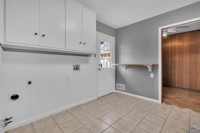 clothes washing area with light tile patterned floors, visible vents, cabinet space, electric dryer hookup, and washer hookup