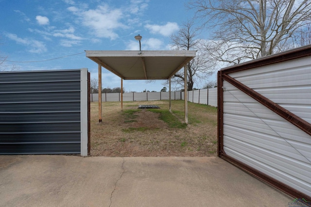 view of yard featuring a patio area and fence