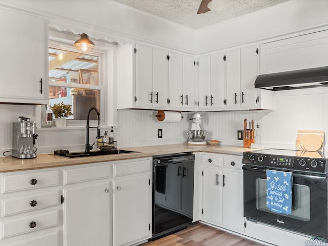 kitchen with sink, black appliances, a textured ceiling, ceiling fan, and white cabinets