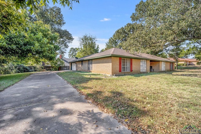 view of home's exterior with a yard