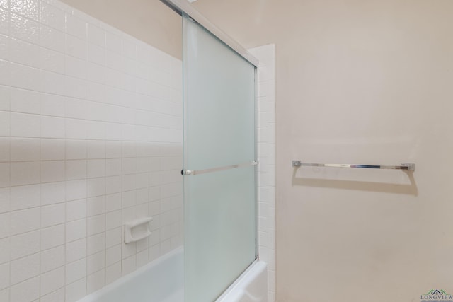 bathroom featuring enclosed tub / shower combo