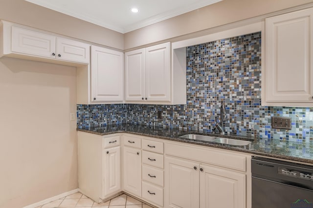 kitchen with dark stone counters, sink, black dishwasher, light tile patterned flooring, and white cabinetry