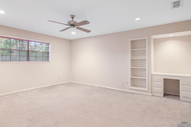 unfurnished bedroom with carpet floors and ceiling fan