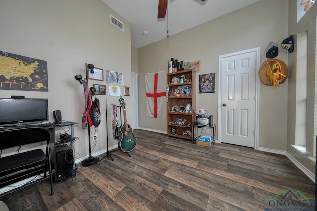 846 Edgewood Cir, Lindale, TX 75771 - home office with dark wood-style floors, ceiling fan, baseboards, and a towering ceiling