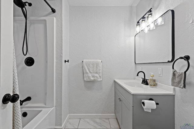 bathroom with vanity and  shower combination