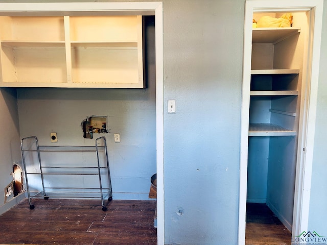 laundry room with electric dryer hookup, dark hardwood / wood-style flooring, and washer hookup