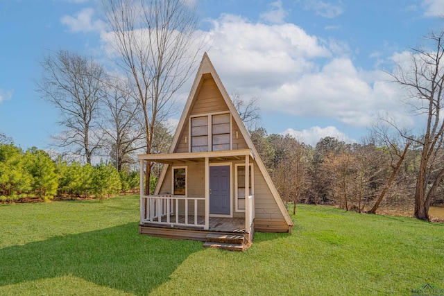 view of outdoor structure with covered porch