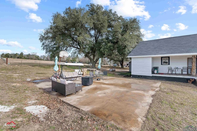 view of yard with a patio area and outdoor lounge area