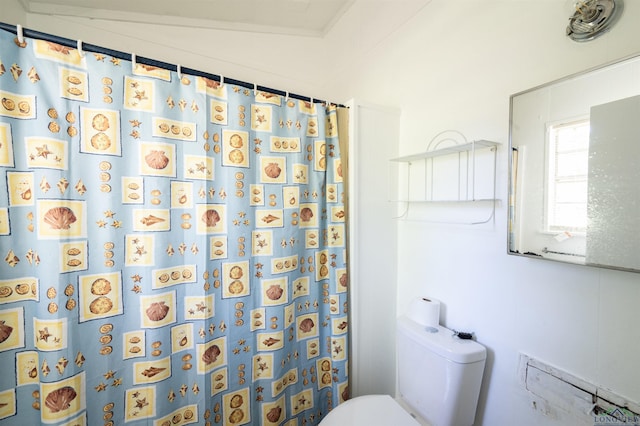 8880 Fm 729, Avinger, TX 75630 - full bath featuring a shower with shower curtain and toilet