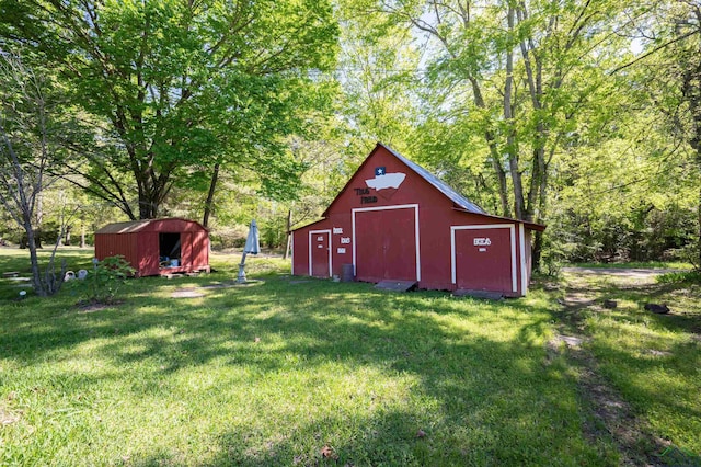 8880 Fm 729, Avinger, TX 75630 - view of barn with a lawn