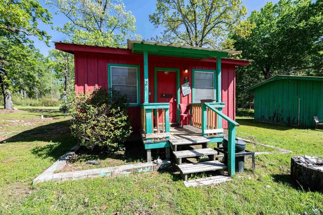 8880 Fm 729, Avinger, TX 75630 - view of outbuilding with an outdoor structure