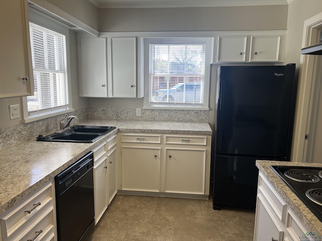 kitchen featuring white cabinetry, sink, and black appliances