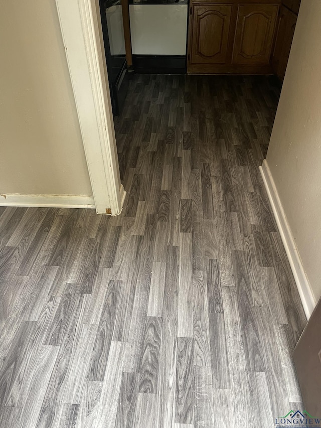 629 Baylor Dr, Longview, TX 75601 - detailed view of wood finished floors and baseboards