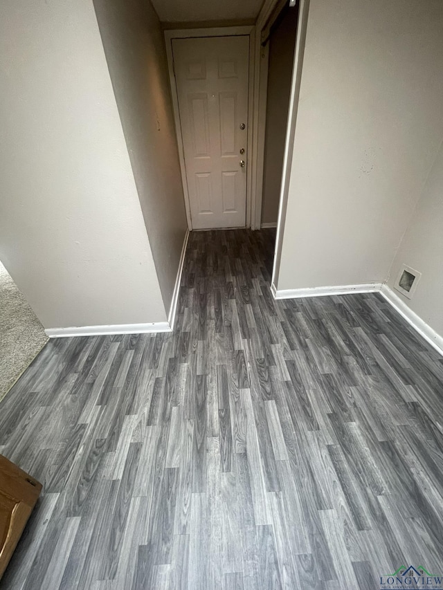 629 Baylor Dr, Longview, TX 75601 - hallway featuring wood finished floors and baseboards