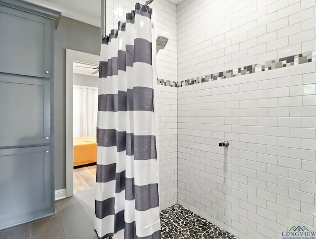 full bath featuring a tile shower