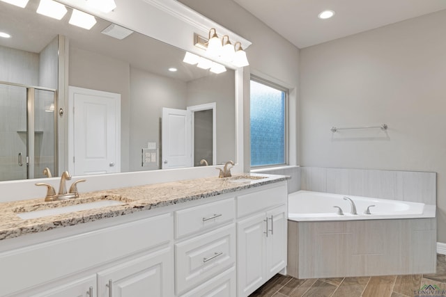 bathroom with vanity and plus walk in shower