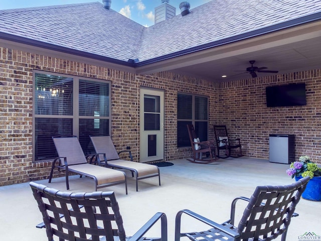 view of patio with ceiling fan