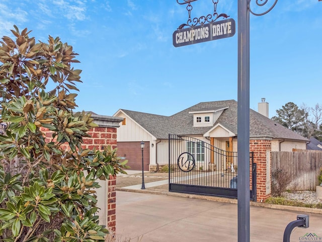 view of front of property with a garage