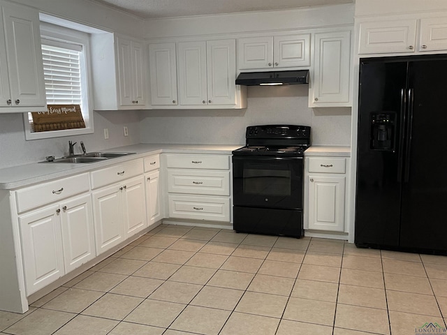 kitchen featuring black appliances, white cabinetry, light tile patterned floors, and sink