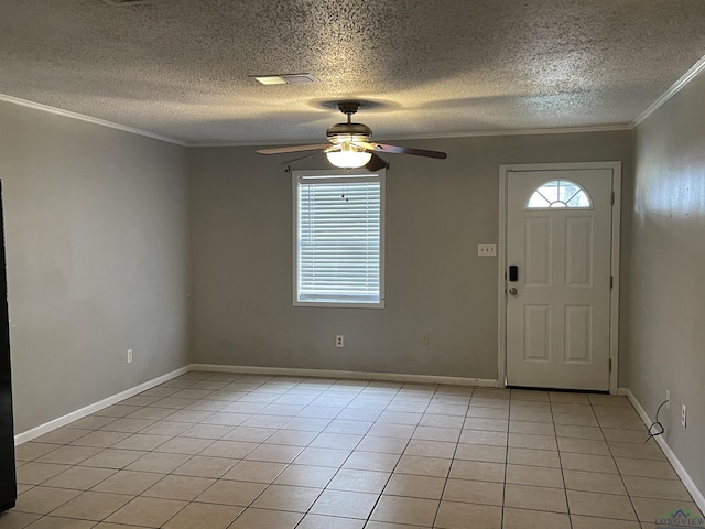 foyer with light tile patterned floors, ceiling fan, and crown molding