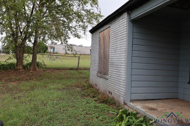 view of home's exterior featuring a lawn