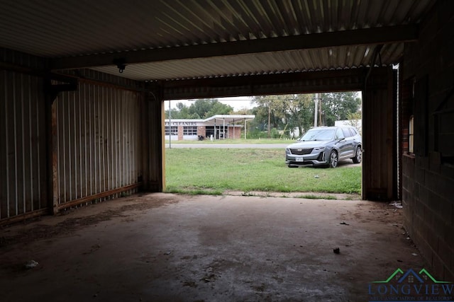 garage with a lawn