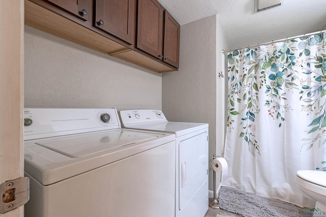 laundry area with washer and clothes dryer