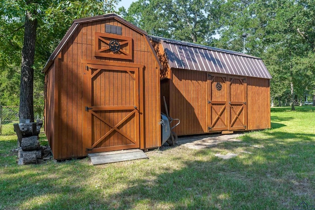 view of outdoor structure with a lawn