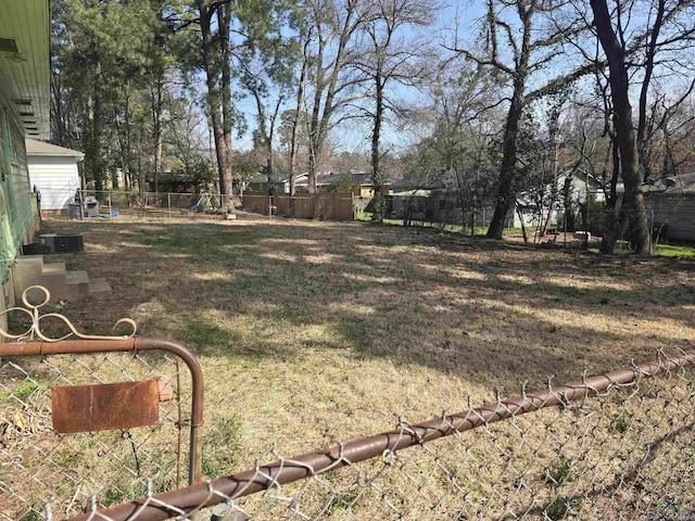 view of yard featuring fence