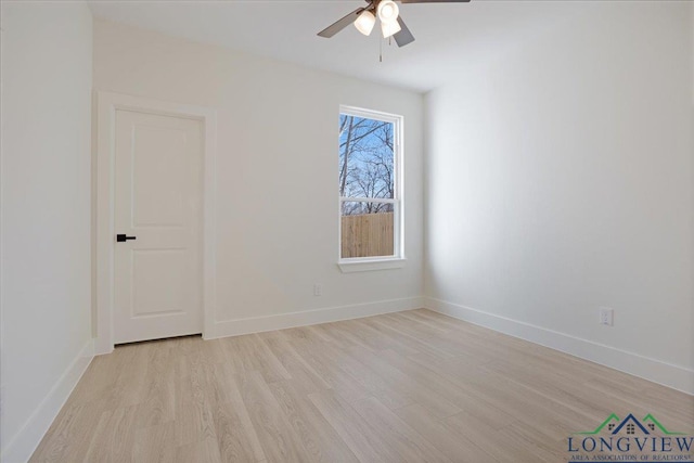 unfurnished room with ceiling fan and light hardwood / wood-style flooring