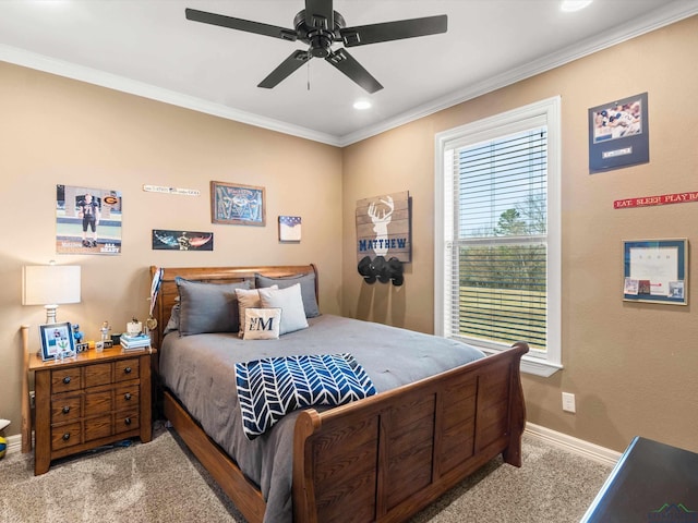 carpeted bedroom with crown molding and ceiling fan