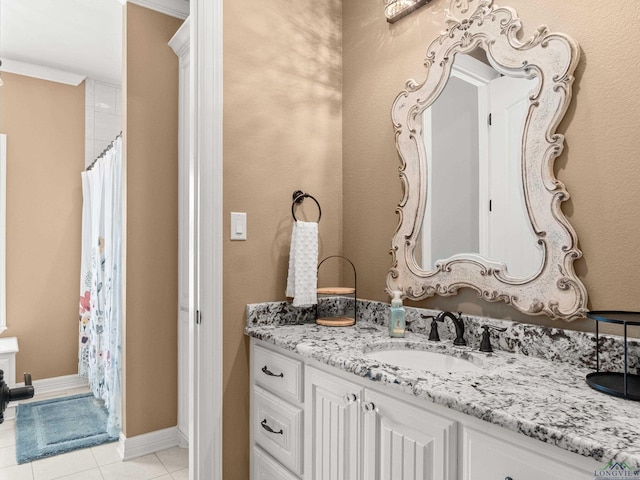 bathroom with vanity and tile patterned floors