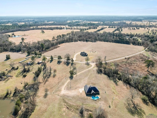 birds eye view of property featuring a rural view